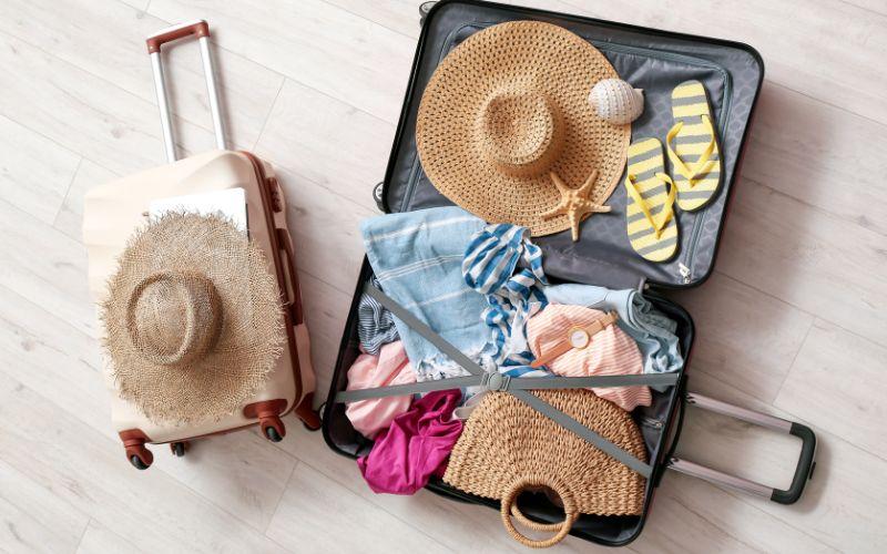 What to pack for Boracay - suitcase on the beach